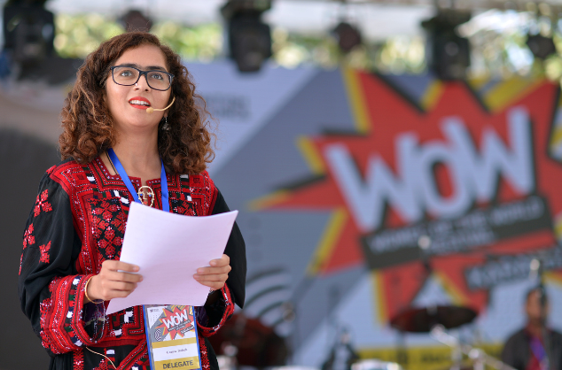 A delegate of WOW Pakistan looks up at the sky