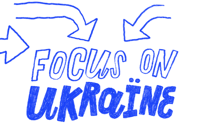 Text, written by hand, 'FOCUS ON UKRAINE' with three arrows pointing to the words.