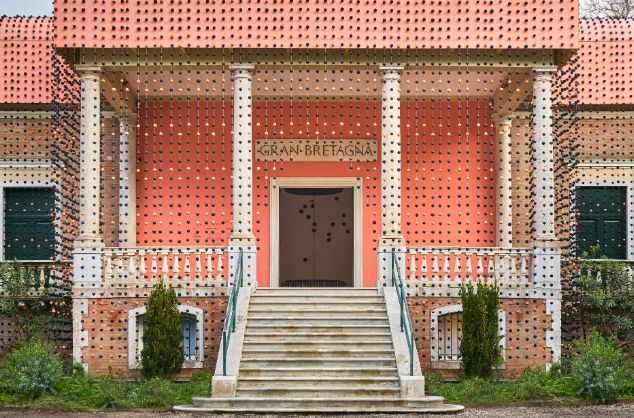 The front of the British Pavilion at Venice Biennale 2025, surrounded by a veil of clay beads