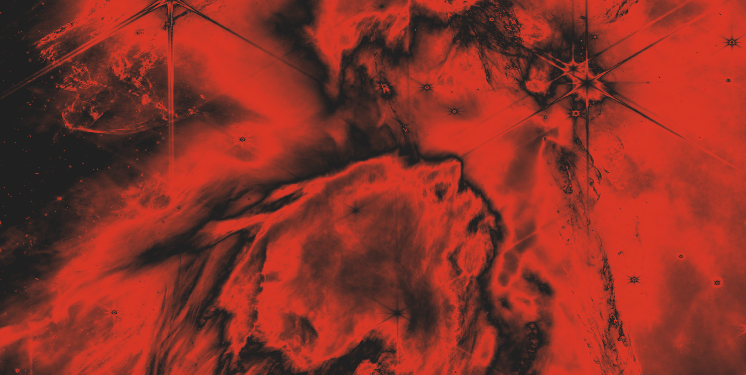 A red and black abstract design that resembles paint or oil swirls on the surface of water