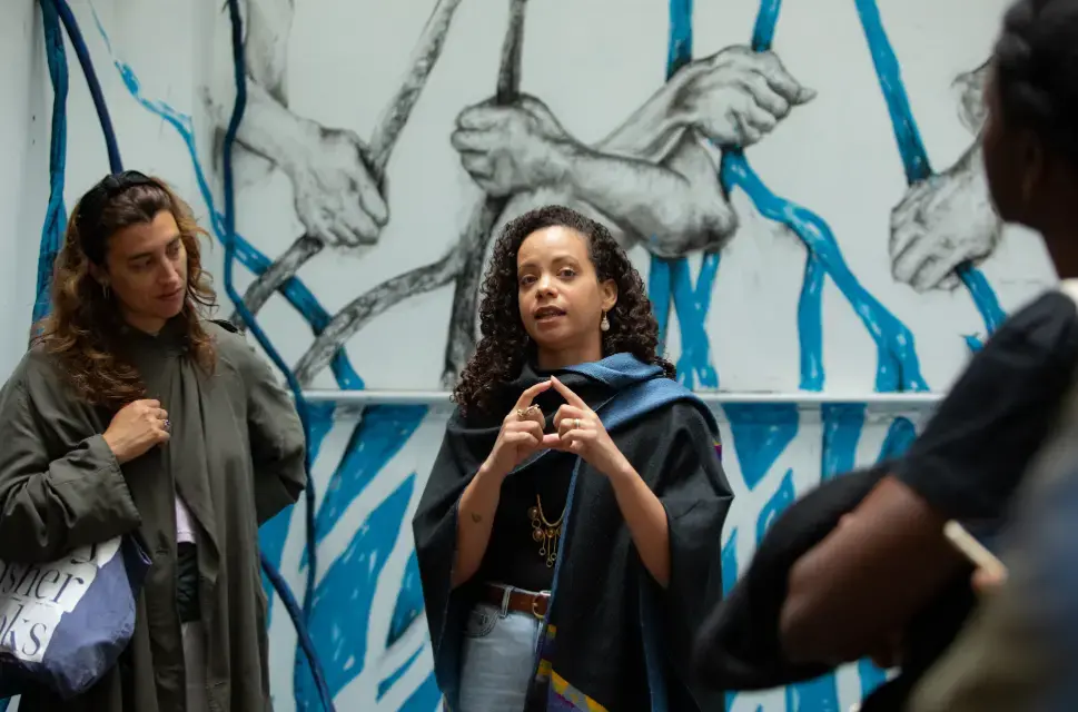 People in a gallery.