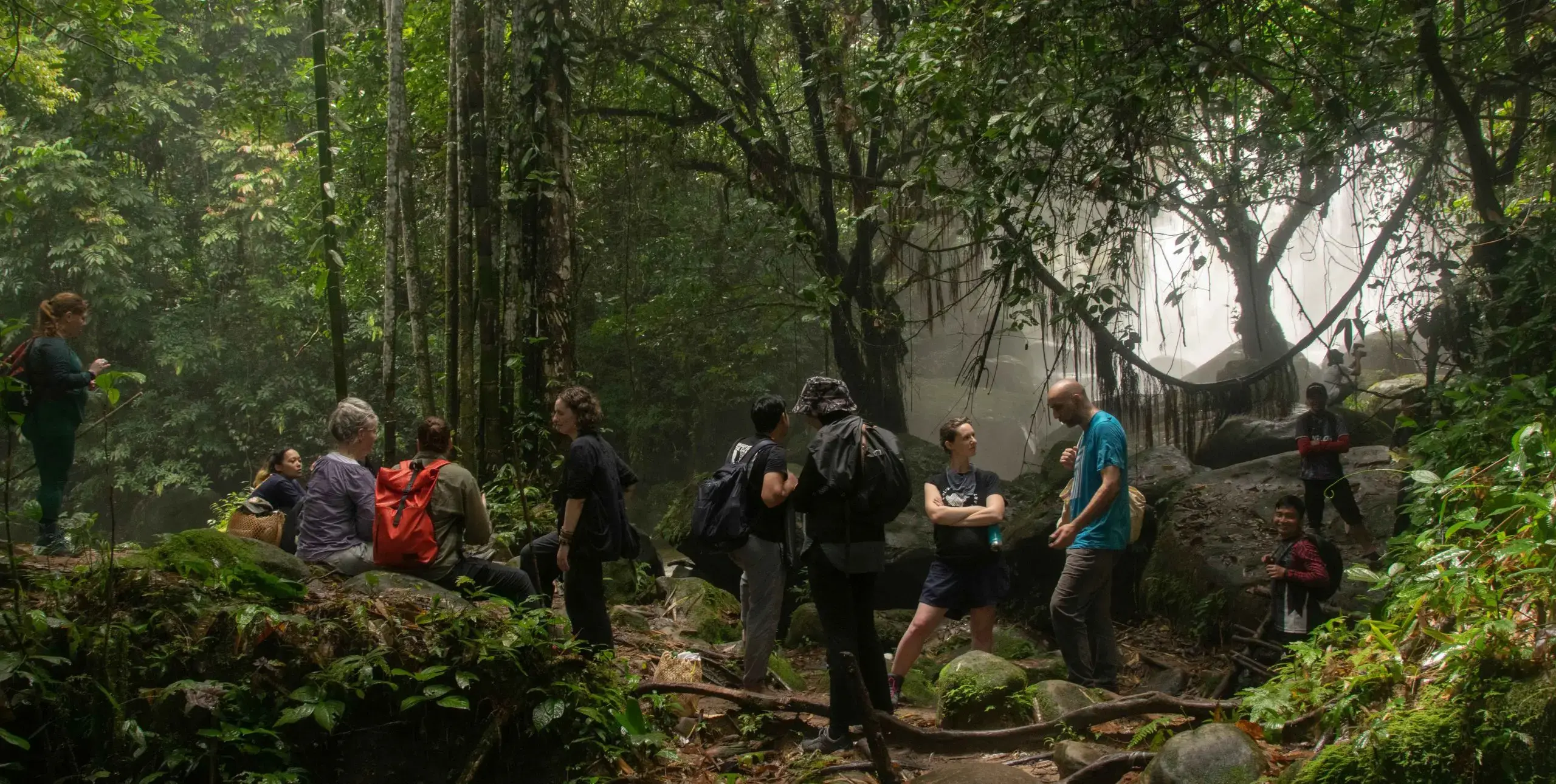 A group of people in a Malaysian jungle