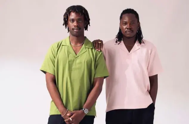 Two men model shirts