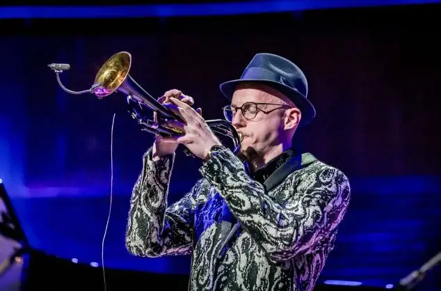 A jazz musician plays the trumpet