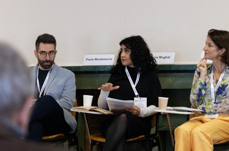 Three conference delegates sitting as part of a circle at a British Council workshop